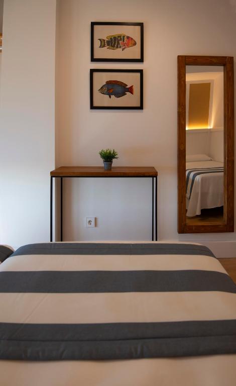 Postel nebo postele na pokoji v ubytování Hotel Els Pins