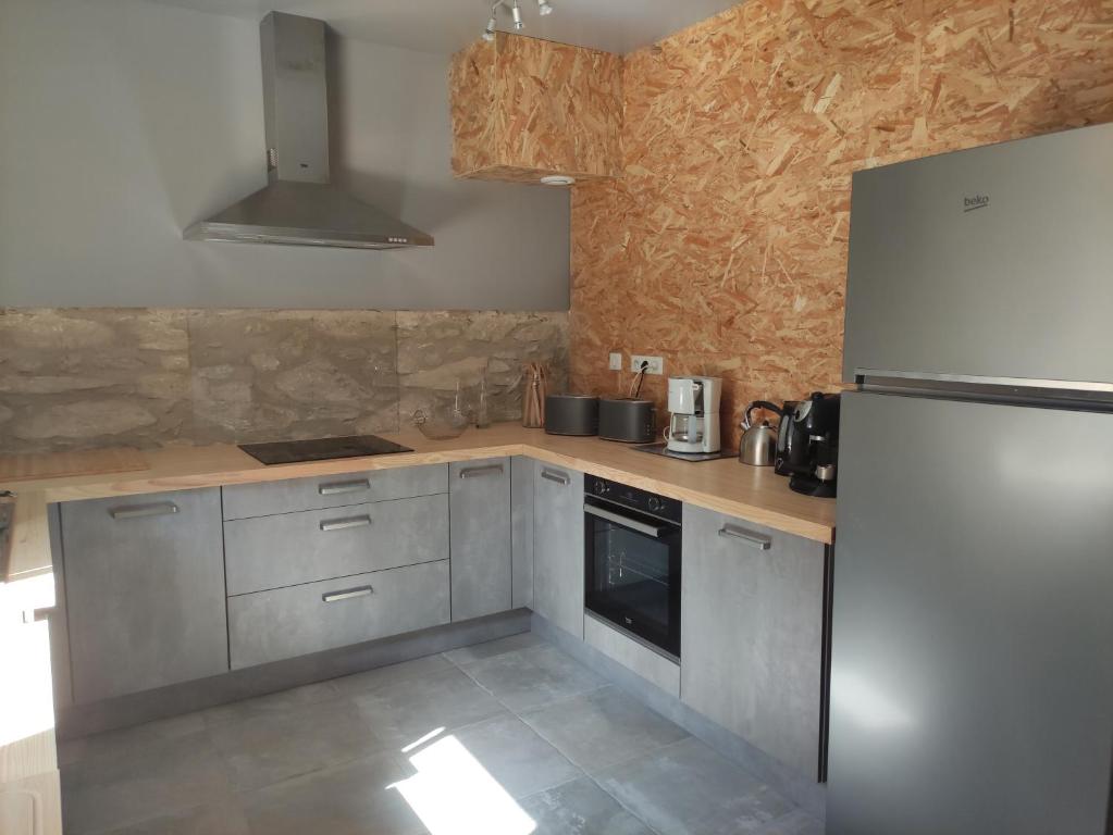 Kuchyň nebo kuchyňský kout v ubytování Chambre Platane