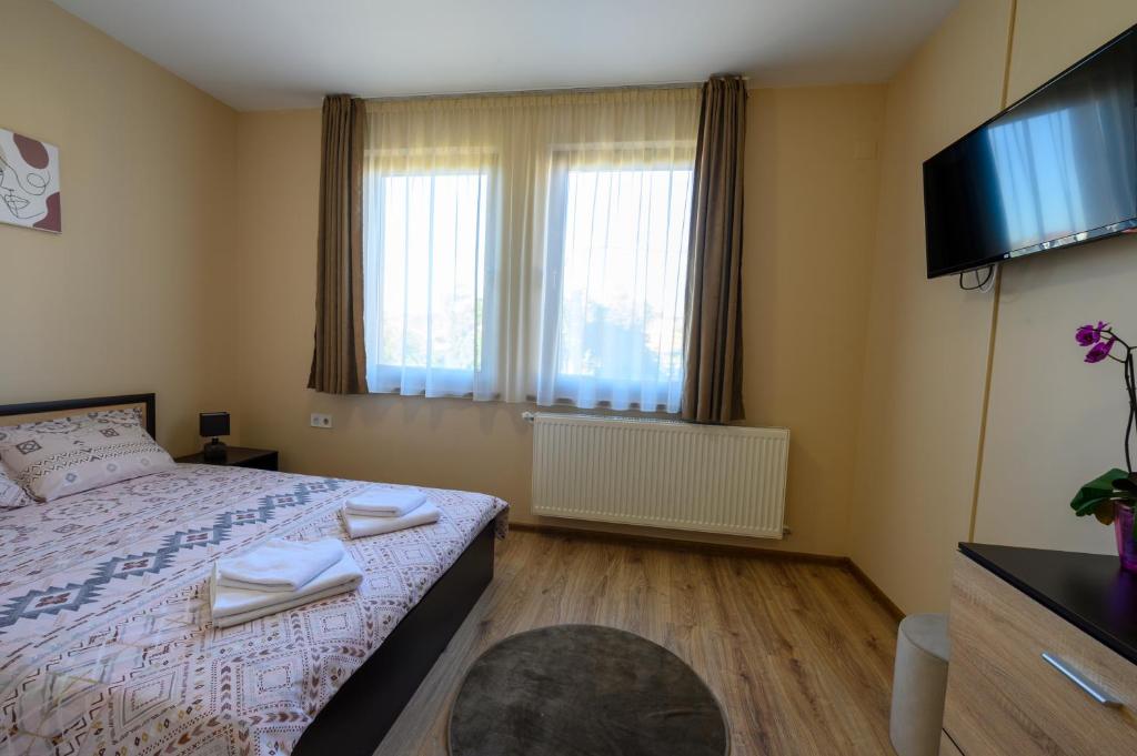Postel nebo postele na pokoji v ubytování Rila Hills