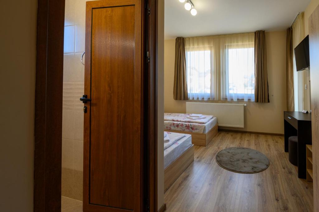 Postel nebo postele na pokoji v ubytování Rila Hills