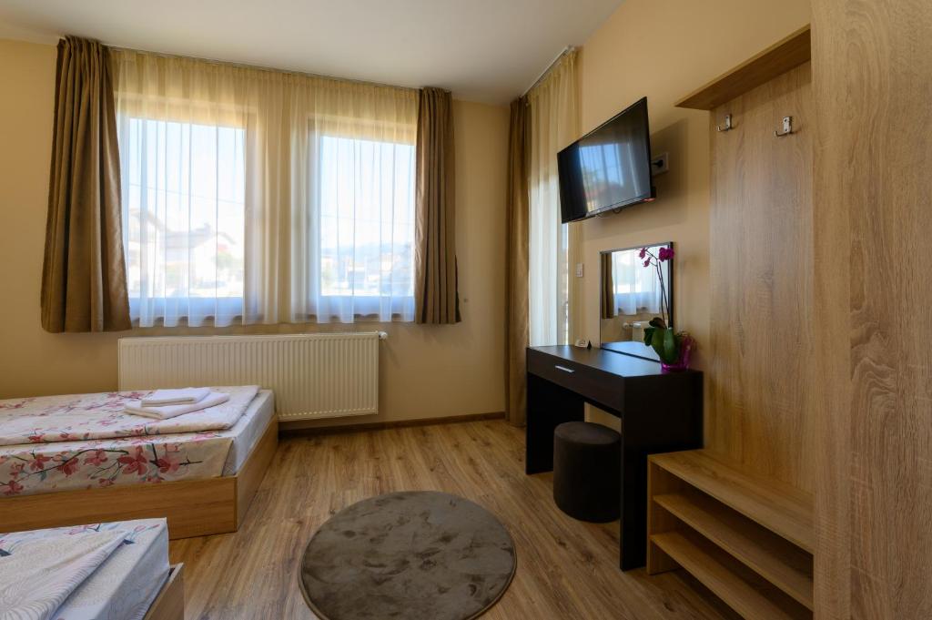 TV a/nebo společenská místnost v ubytování Rila Hills
