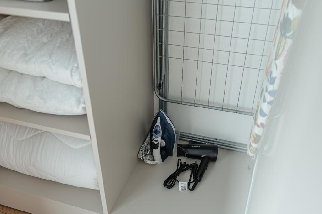 Postel nebo postele na pokoji v ubytování AWA Residence