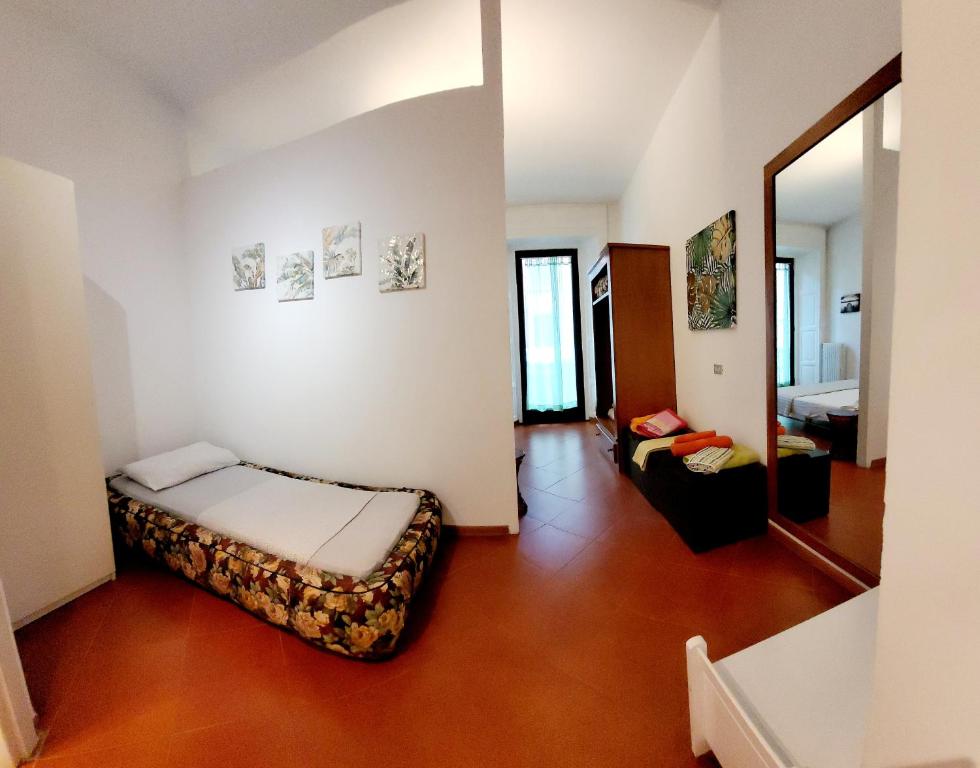 Posteľ alebo postele v izbe v ubytovaní Le 5 vie, lago Maggiore