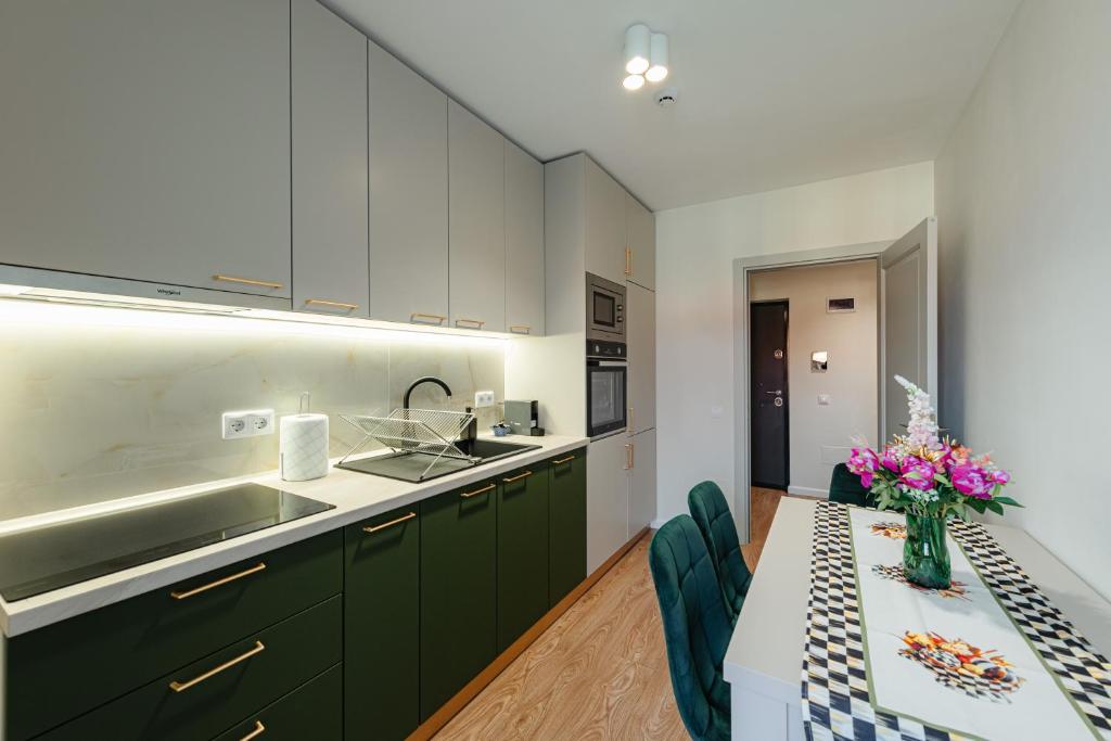 Kuchyň nebo kuchyňský kout v ubytování AWA Residence