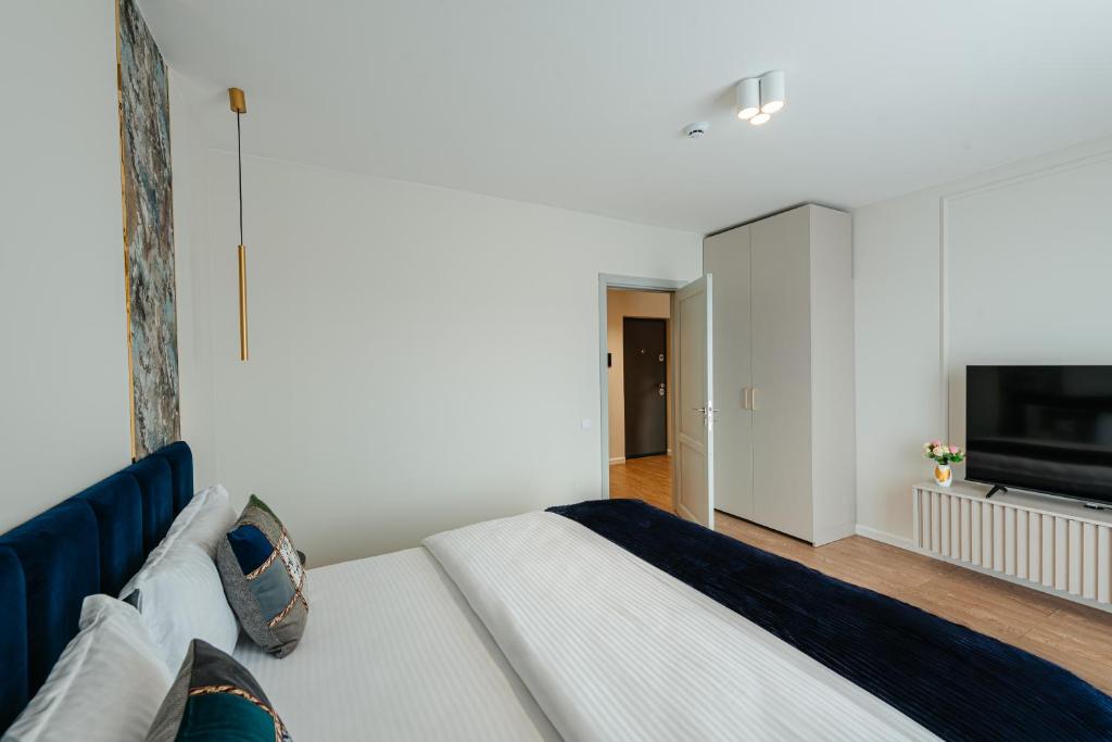 TV a/nebo společenská místnost v ubytování AWA Residence