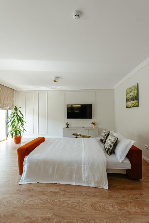 Postel nebo postele na pokoji v ubytování AWA Residence