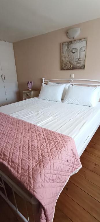 A bed or beds in a room at Arhontiko Katerina Spili
