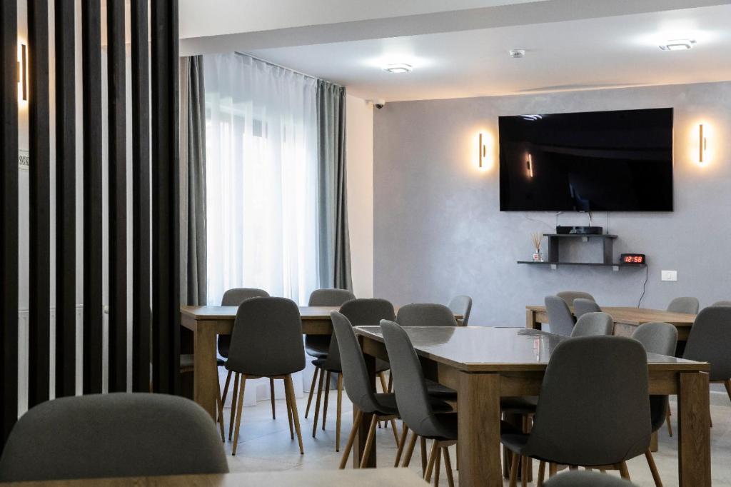 TV a/nebo společenská místnost v ubytování Casa Orhideea