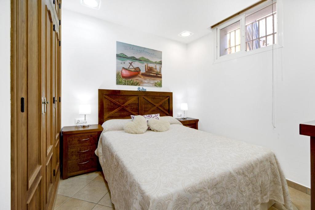 Ένα ή περισσότερα κρεβάτια σε δωμάτιο στο Apartamento Primer linea de playa