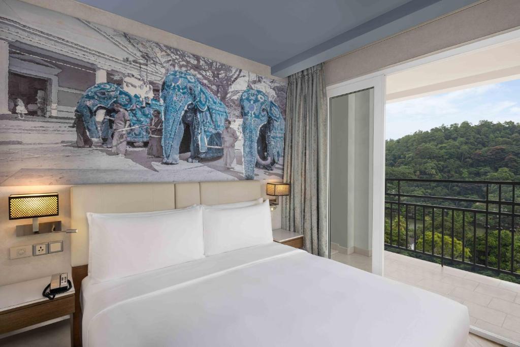 Postel nebo postele na pokoji v ubytování Radisson Hotel Kandy