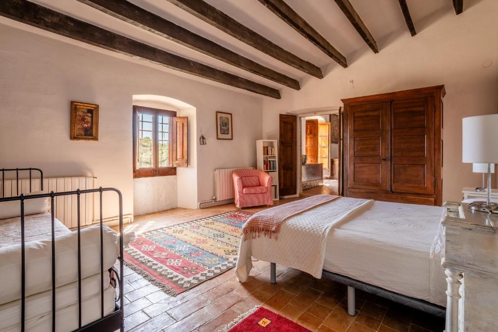 Postel nebo postele na pokoji v ubytování Mas Català