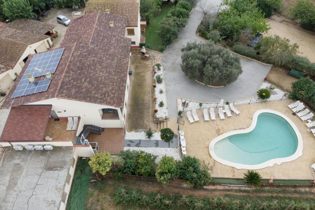 an aerial view of a house with a swimming pool at La Caseta in L'Ametlla del Vallès