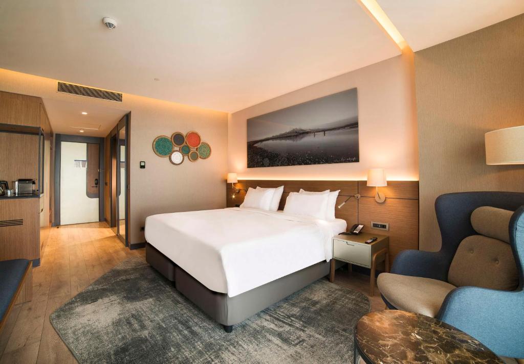 Кровать или кровати в номере Radisson Blu Hotel, Mount Erciyes