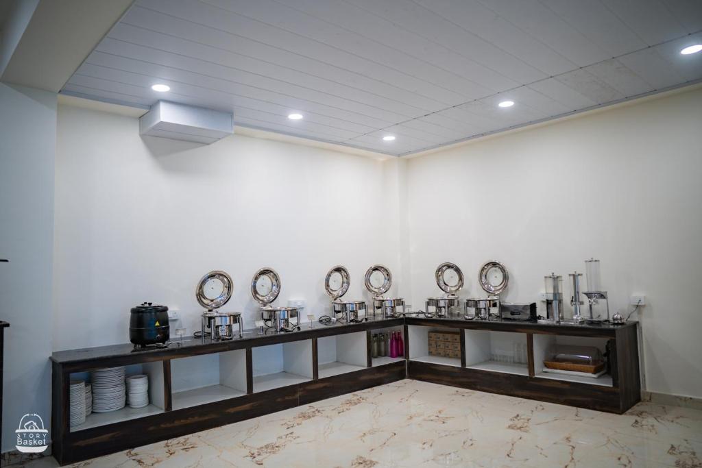 Příslušenství pro přípravu čaje a kávy v ubytování Hotel Mazong Crest
