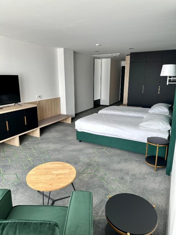 Posteľ alebo postele v izbe v ubytovaní Hotel Diplomat