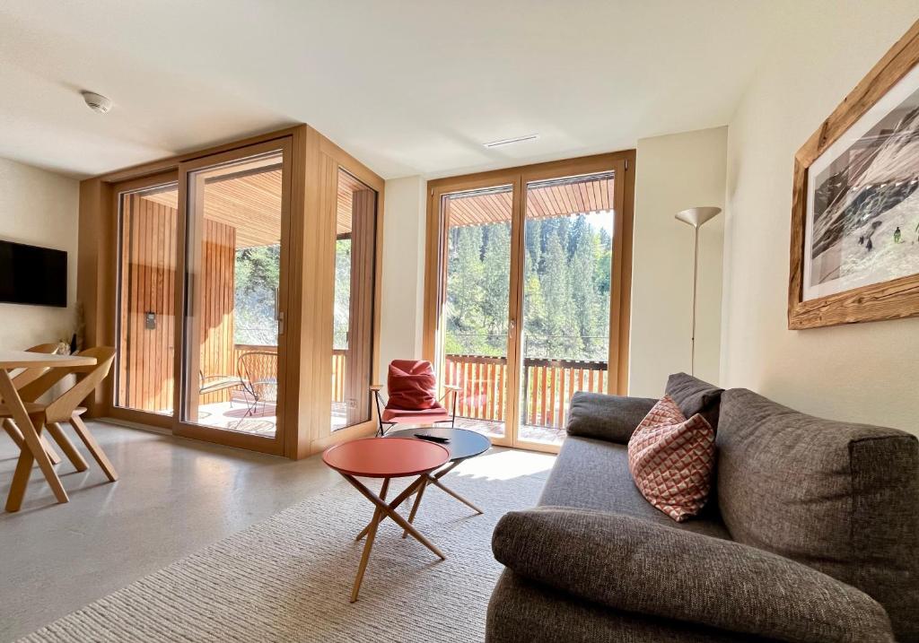 TV a/nebo společenská místnost v ubytování Ferienwohnung Stenna SELVA direkt bei Bergbahnen Skipiste