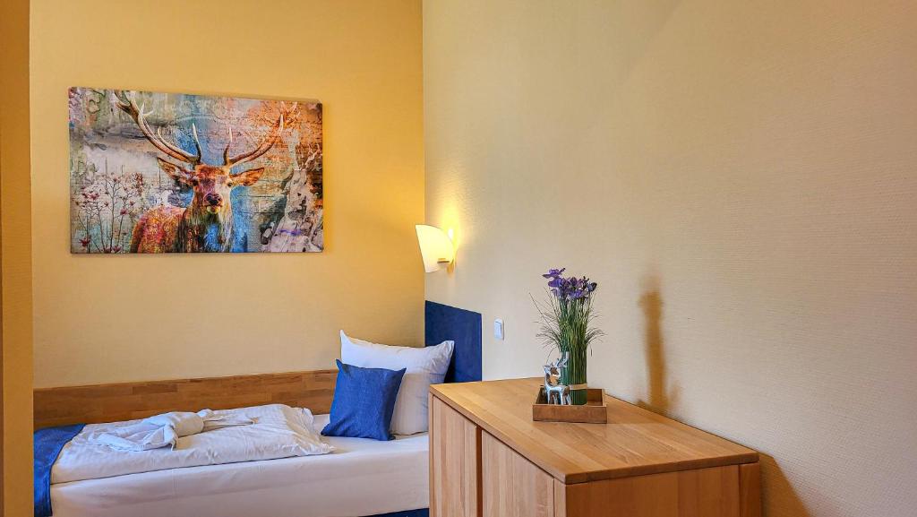 Postel nebo postele na pokoji v ubytování Ferien Residenz Thüringer Wald