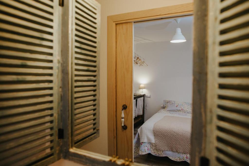 Postel nebo postele na pokoji v ubytování Casa Rural Valle de Tena
