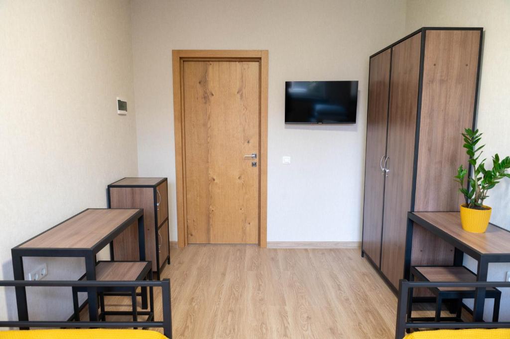 TV a/nebo společenská místnost v ubytování Hostel H