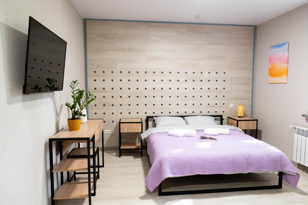 Postel nebo postele na pokoji v ubytování Hostel H