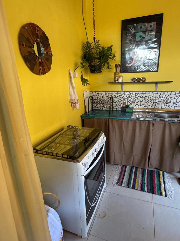 Kuchyň nebo kuchyňský kout v ubytování Camping kalango centro de Alto Paraíso