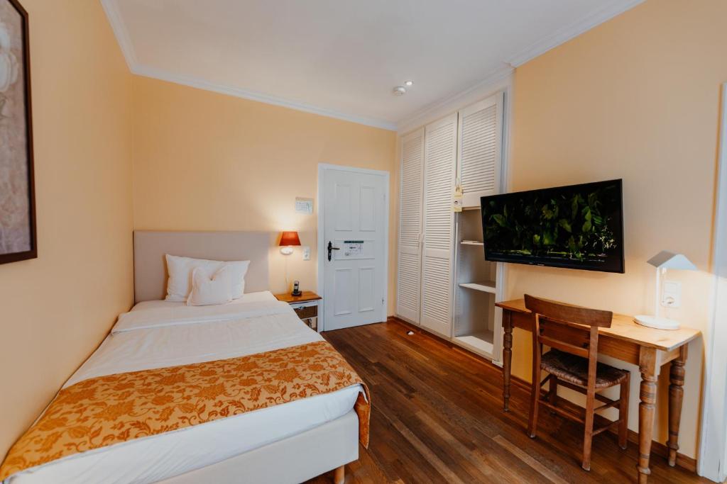 Postel nebo postele na pokoji v ubytování Hotel Hüttmann