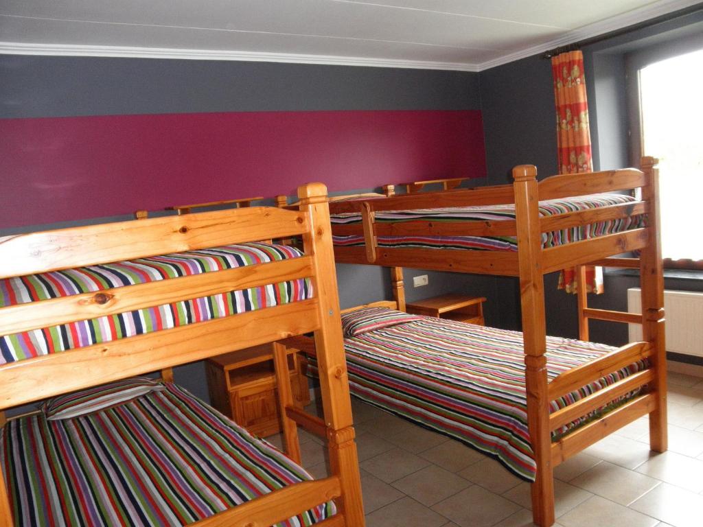 Postel nebo postele na pokoji v ubytování Bastogne Maison de vacances avec sauna