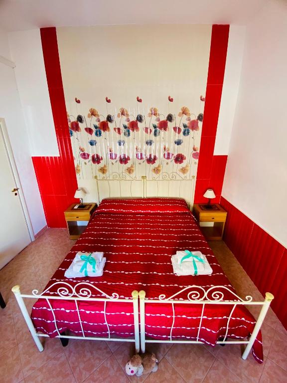 Postel nebo postele na pokoji v ubytování Casa Fronte Mare
