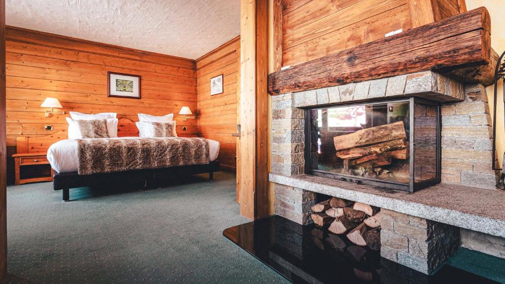Кровать или кровати в номере Hotel Mont Vallon