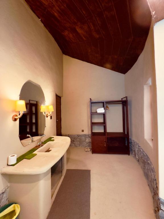 Postel nebo postele na pokoji v ubytování Sukoon Resorts