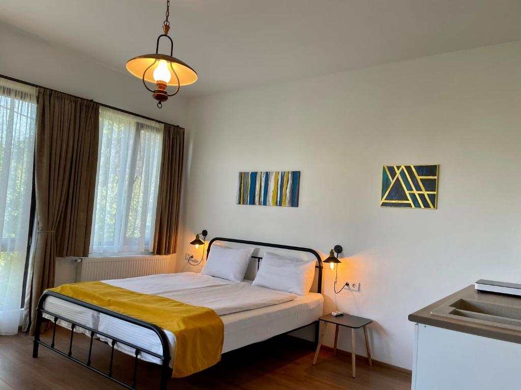 Postel nebo postele na pokoji v ubytování Friendly Home