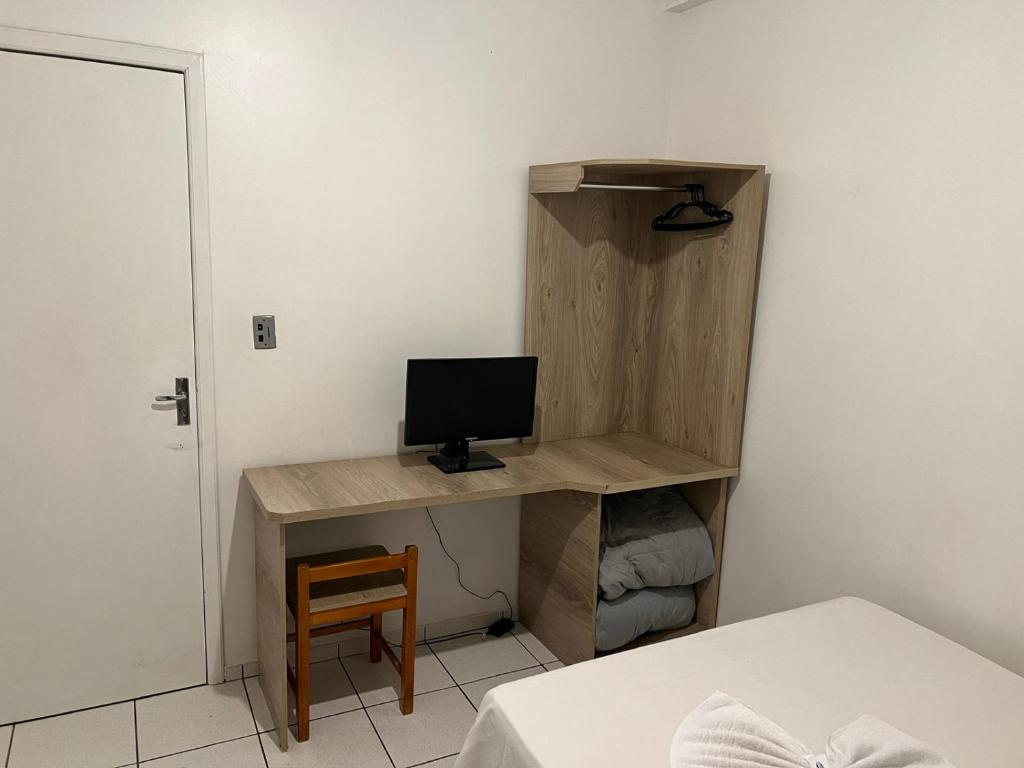 TV a/nebo společenská místnost v ubytování Hotel Mello