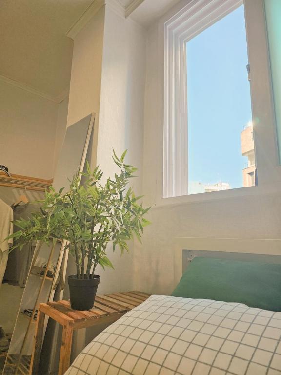 Postel nebo postele na pokoji v ubytování Gurum Stay