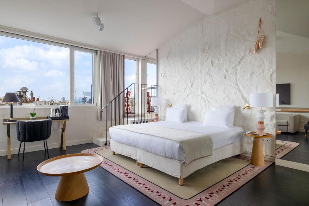 Postel nebo postele na pokoji v ubytování Hotel Astra Opera - Astotel