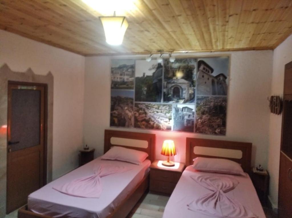 Posteľ alebo postele v izbe v ubytovaní Guest House Bake