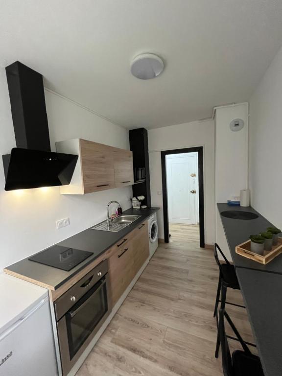 Dapur atau dapur kecil di Appartement proche de la citadelle