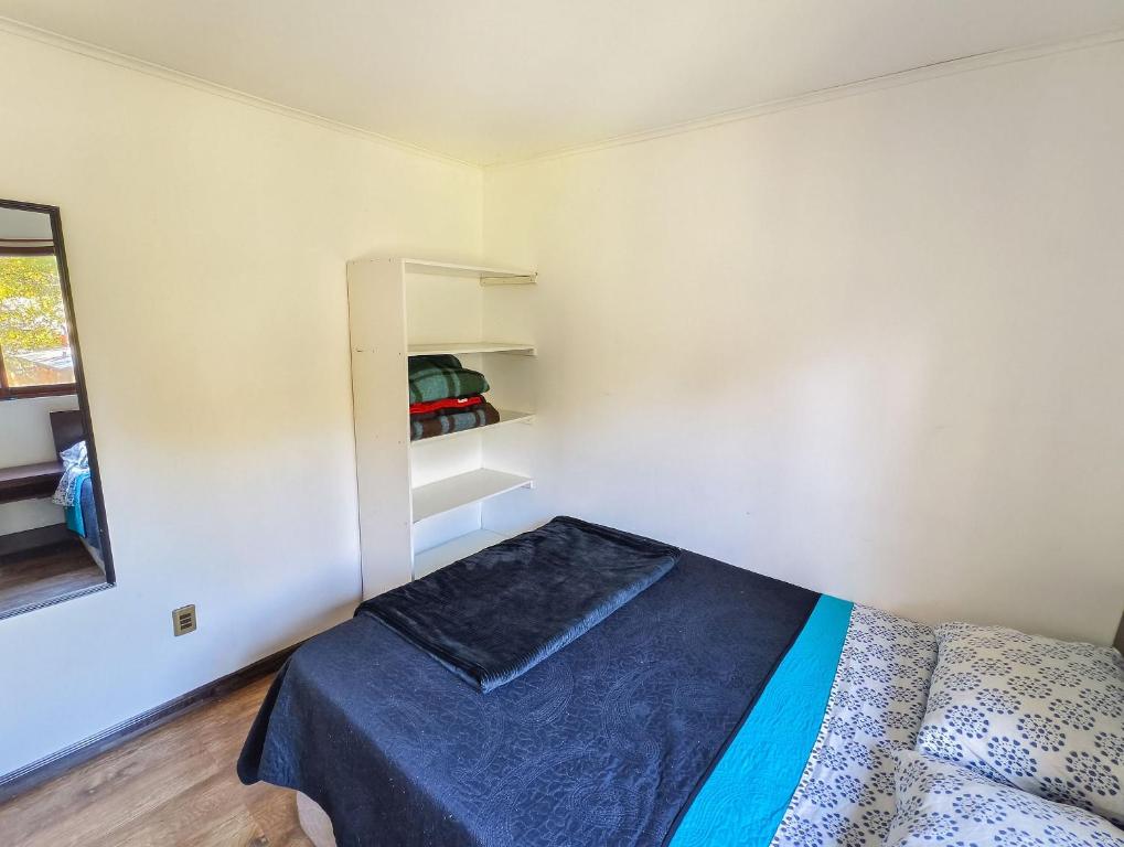 Letto o letti in una camera di Habitación n°4 | Hostal La Casona Pucón