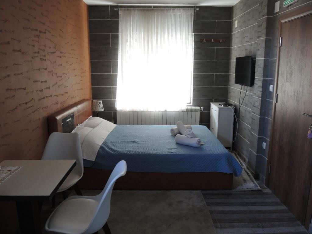 Postel nebo postele na pokoji v ubytování Rooms&Restaurant 43