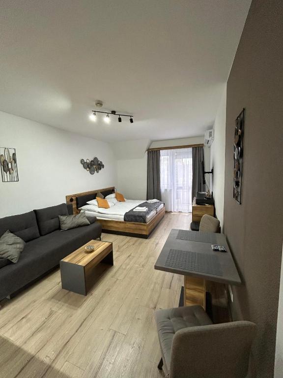 Istumisnurk majutusasutuses D&D Wellness Apartmanok - Dávid Wellness Apartman