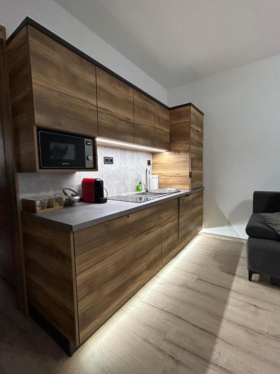 Köök või kööginurk majutusasutuses D&D Wellness Apartmanok - Dávid Wellness Apartman