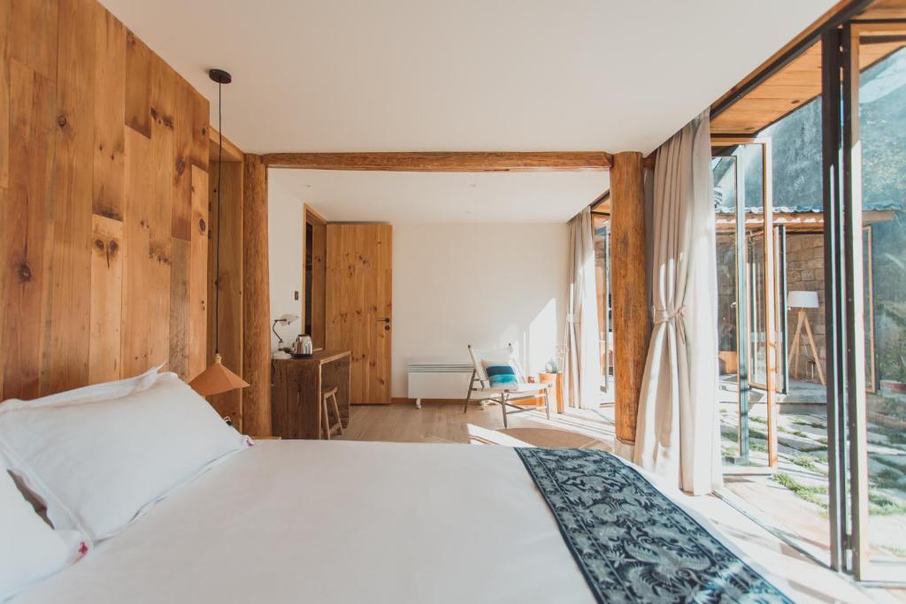 Postel nebo postele na pokoji v ubytování Infini House