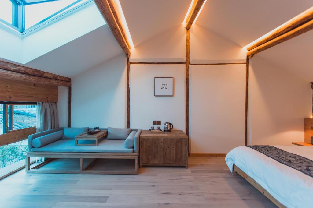 Postel nebo postele na pokoji v ubytování Infini House