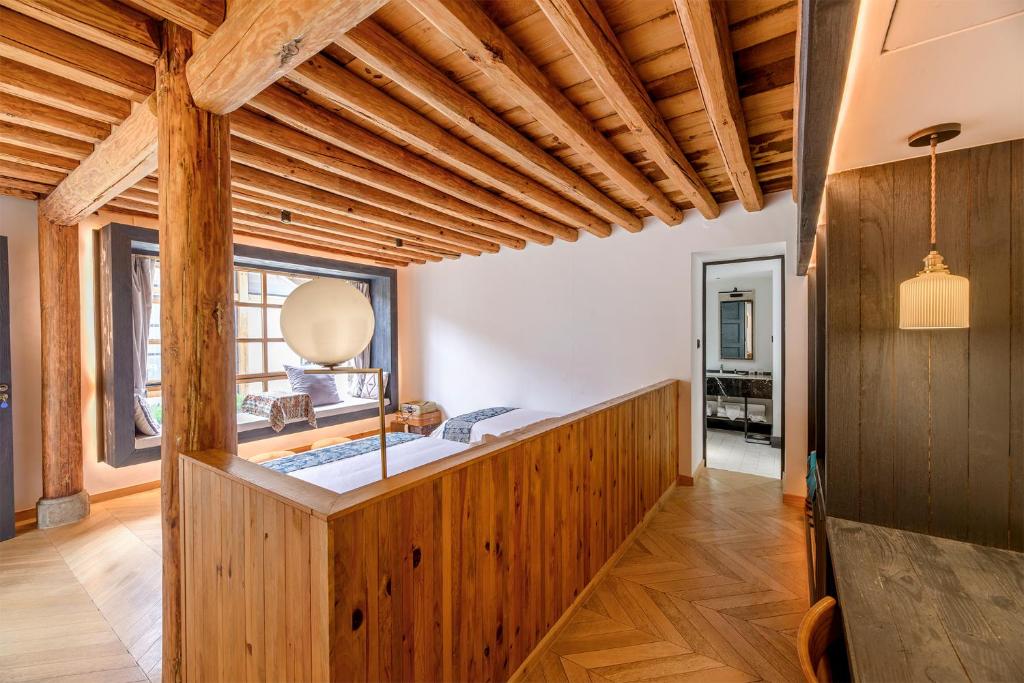 Postel nebo postele na pokoji v ubytování Infini House