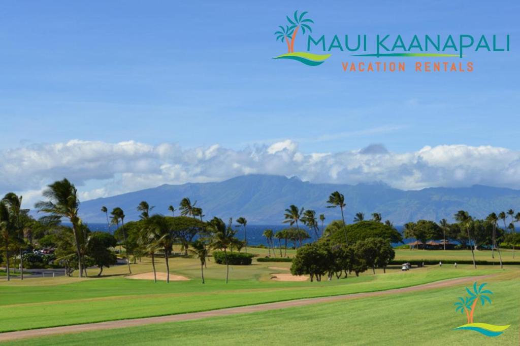 a picture of a park with palm trees and mountains at Maui Eldorado Condo A210 in Kaanapali