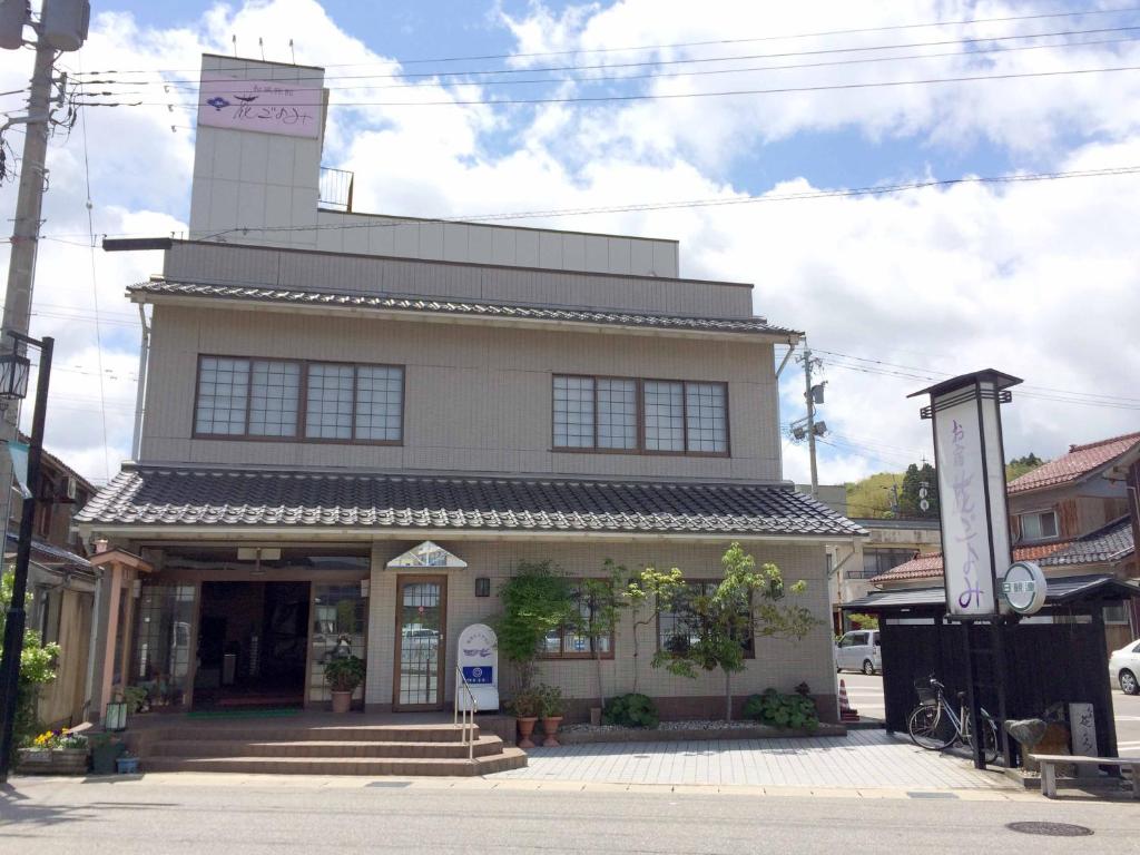 a building with a tower on top of it at Hanagoyomi in Nanao
