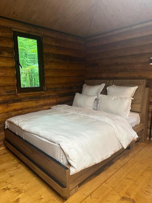 Postel nebo postele na pokoji v ubytování Wald Hotel Lagodekhi Rooms