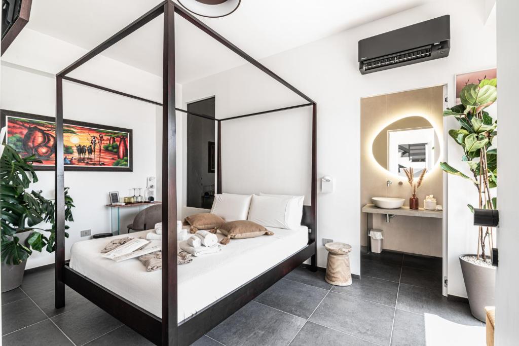 Postel nebo postele na pokoji v ubytování Luxury B&b Euphorbia