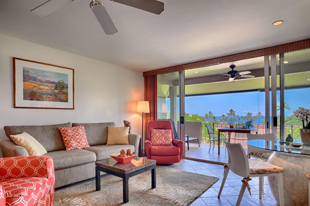 a living room with a couch and a table at Maui Eldorado Condo K206 in Kaanapali