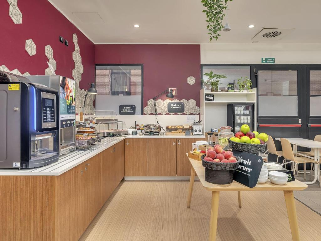 Kuchyň nebo kuchyňský kout v ubytování B&B Hotel Como Camerlata