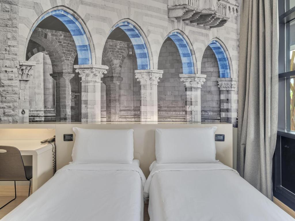 Postel nebo postele na pokoji v ubytování B&B Hotel Como Camerlata